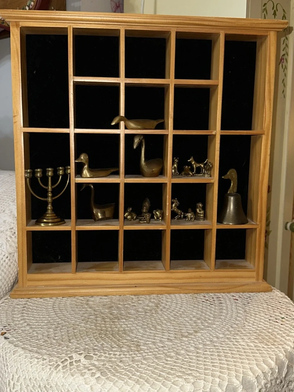 Wooden Grid Display Shelf Wall Decor in Natural Pine &brass figurines
